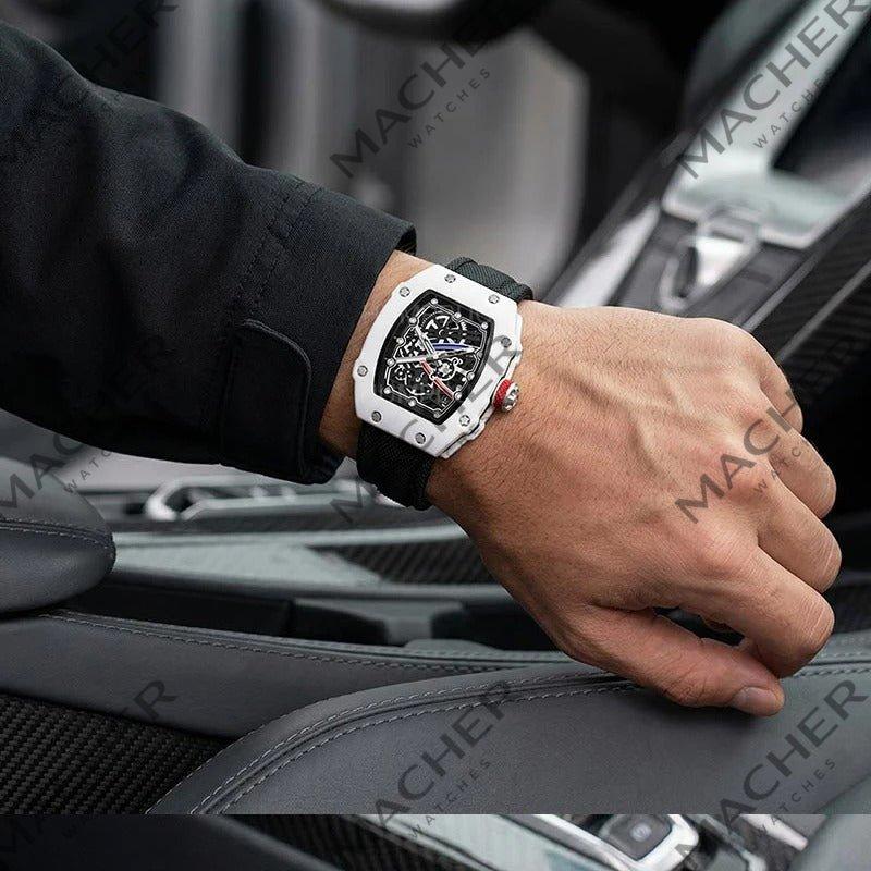 Luxury motorsport-inspired watch with carbon fiber case and skeleton dial, worn in high-performance car interior