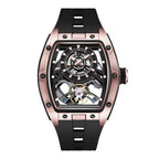 Motorsport-inspired luxury watch with rose gold-toned case, skeleton dial, black rubber strap