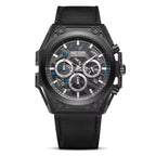 Machined black chronograph watch with blue accents, inspired by motorsport luxury design and bold wrist presence.