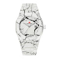 White marble-patterned luxury watch with date display and bold sport-inspired design
