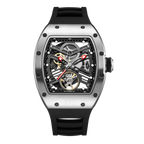 Luxury skeleton automatic watch with visible gears, tonneau case, and black rubber strap