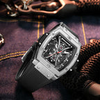 Luxury racing-inspired tonneau watch with skeleton dial and rubber strap on denim backdrop