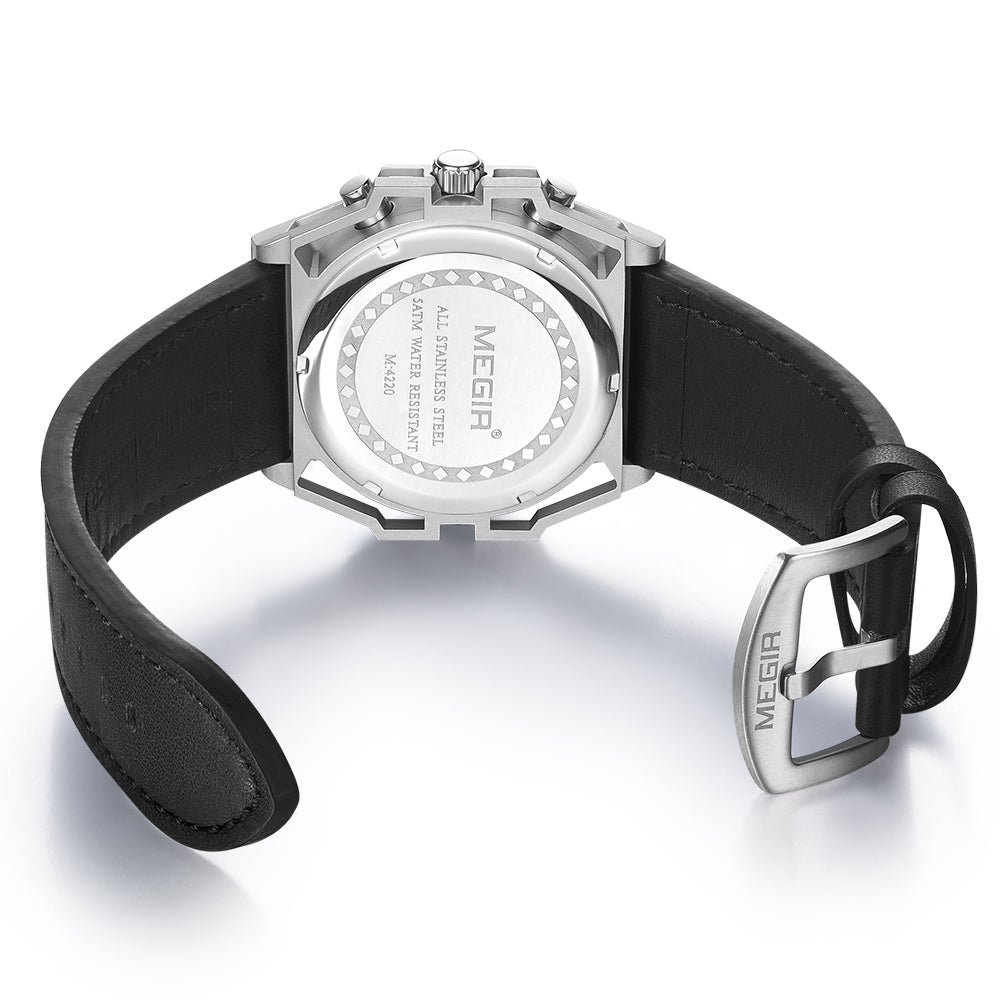 Machined stainless steel watch back with black leather strap, motorsport-inspired luxury timepiece design