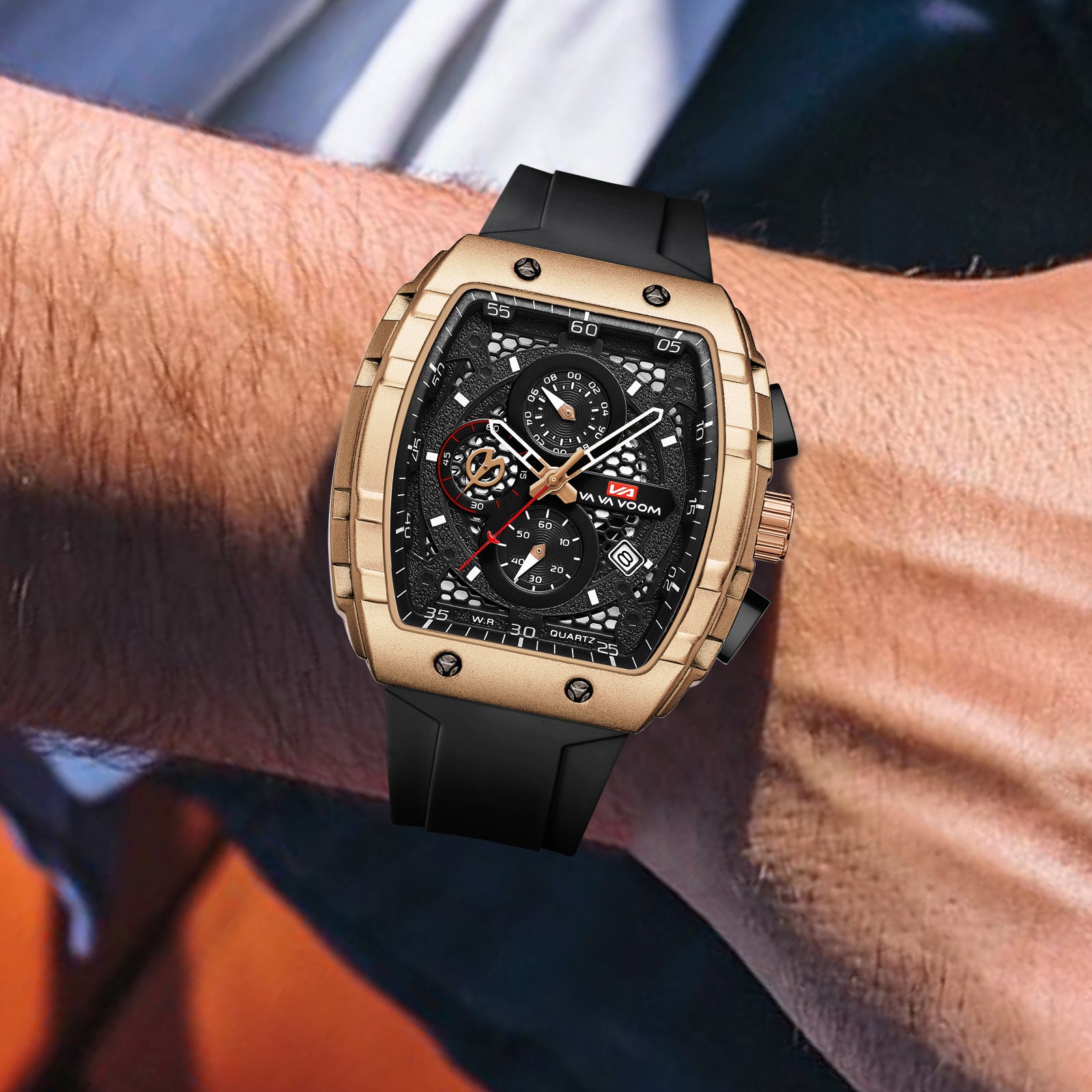Luxury gold-tone chronograph watch with black dial, bold motorsport design, and rubber strap for everyday wear