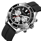 Sport-luxury chronograph watch with black dial, silver subdials, and black rubber strap