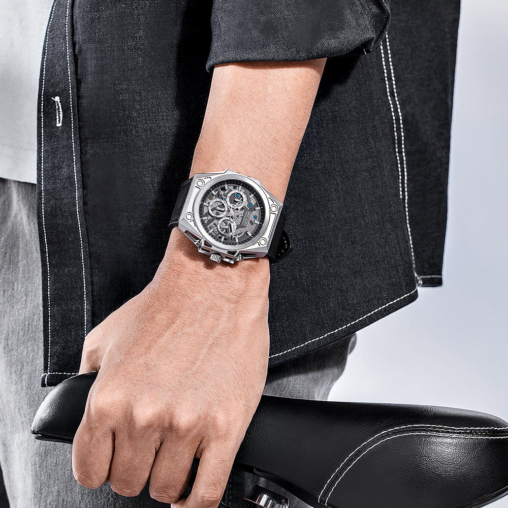 Luxury chronograph watch with skeleton dial, carbon fiber case, and bold sport-luxury design on wrist