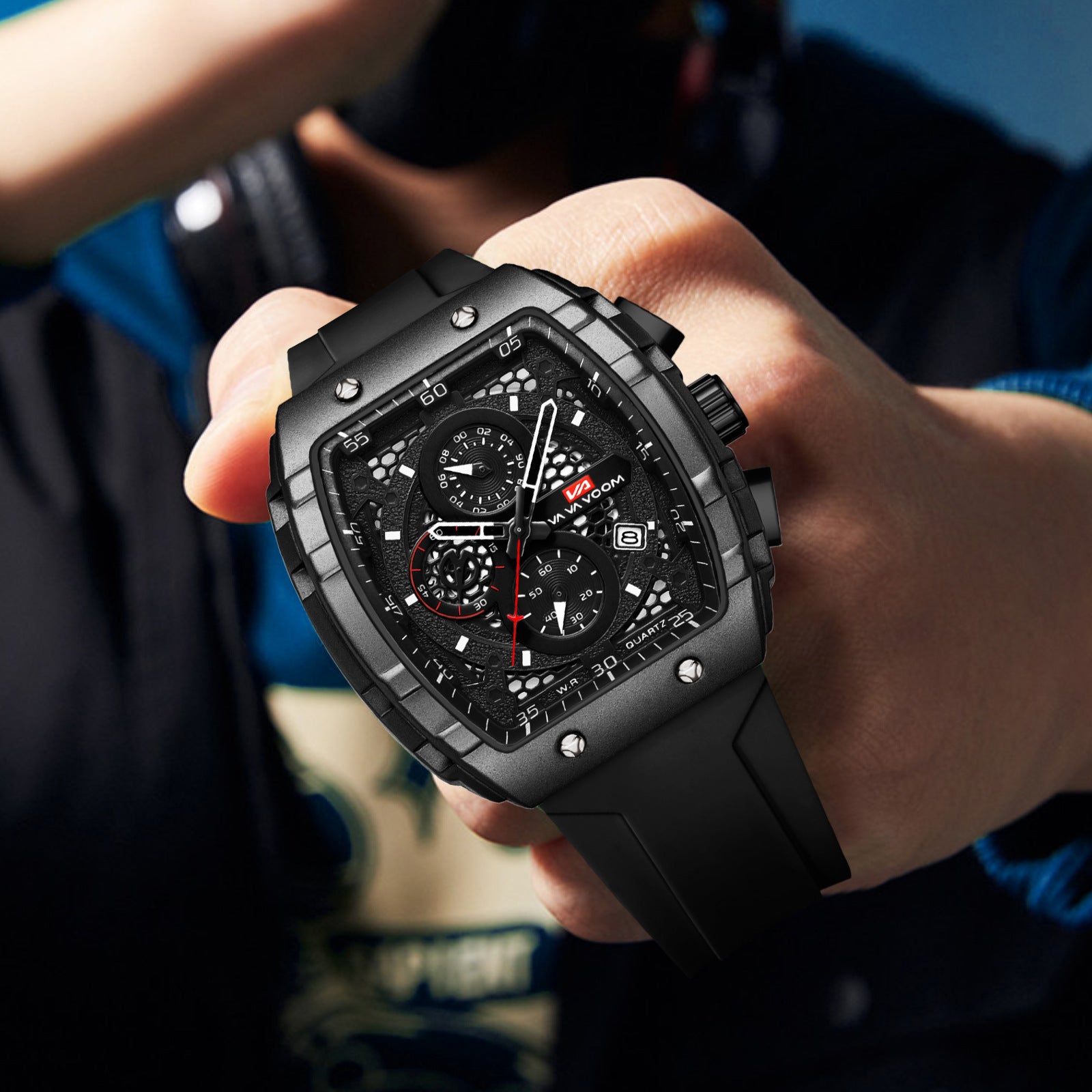 Bold black chronograph watch with carbon fiber case, motorsport-inspired design, and sport-luxury style for everyday wear.