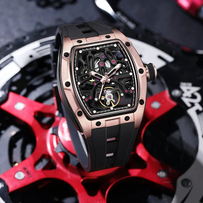 Motorsport-inspired luxury watch with skeleton dial, rose gold-tone case, and black rubber strap