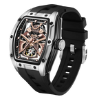 Luxury tonneau-shaped skeleton watch with exposed gears, rose gold accents, black rubber strap
